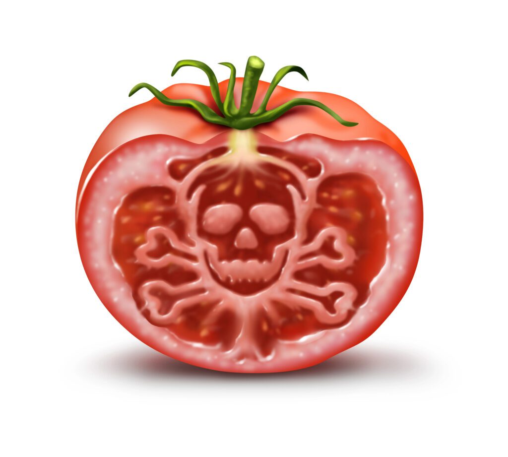 A tomato with a cross-sectional image showing a skull and crossbones design in the center, symbolizing danger or toxicity.